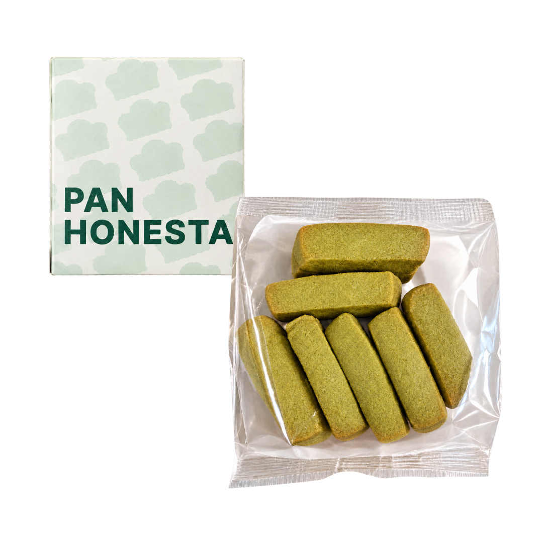 Pan Honesta branded box and a clear plastic bag containing rectangular green tea or matcha flavored cookies.