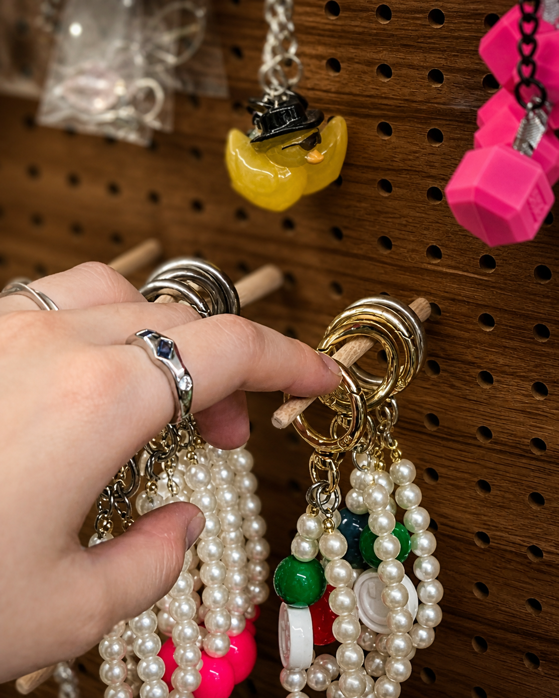 Art-directed catalog photograph of pearl and colorful beaded jewelry pieces
