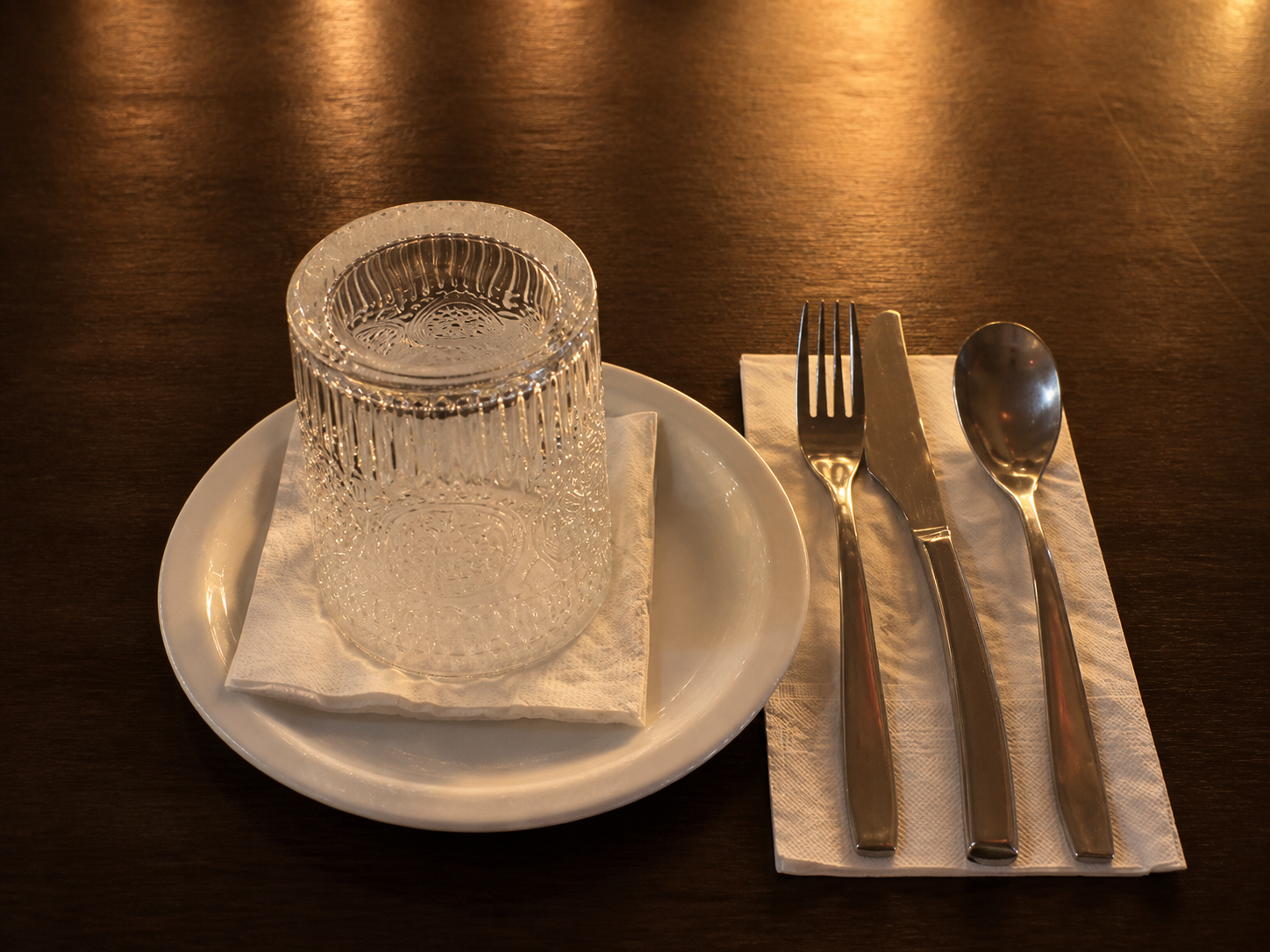 Candlelit place setting at KKIK Seoul