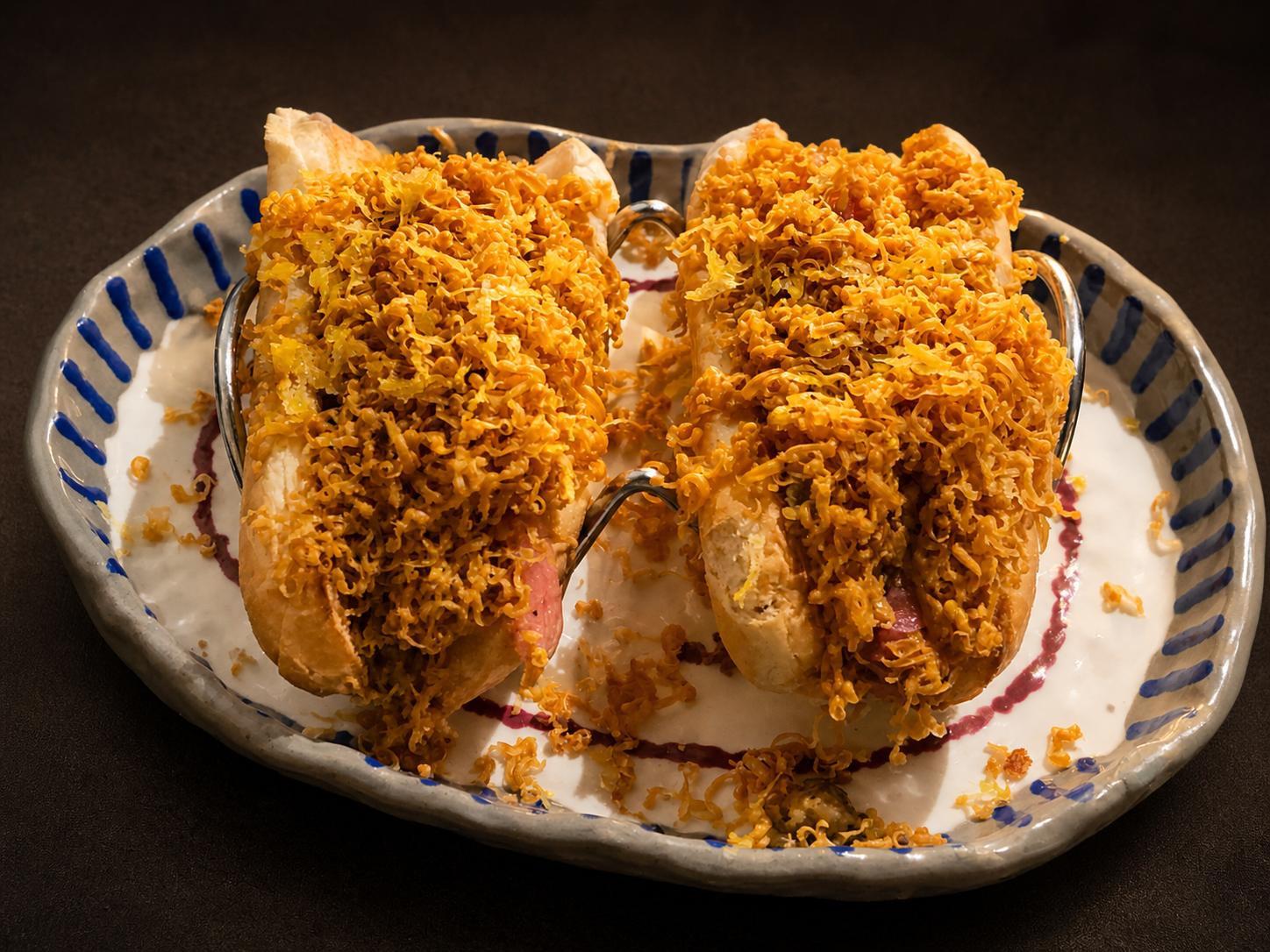 Crispy hotdog with a golden topping at KKIK Seoul