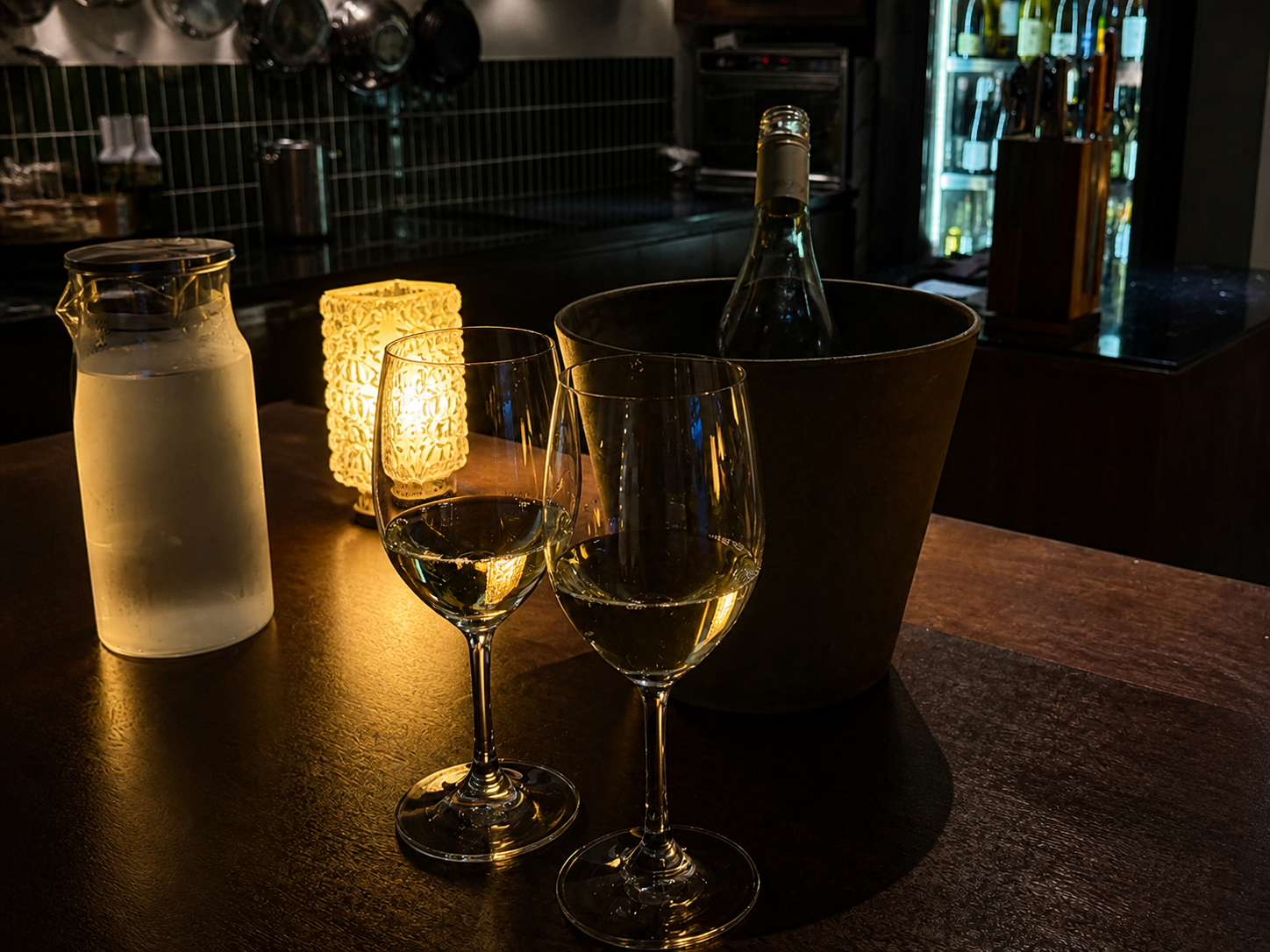 Wine glasses and a bottle at the KKIK Seoul counter