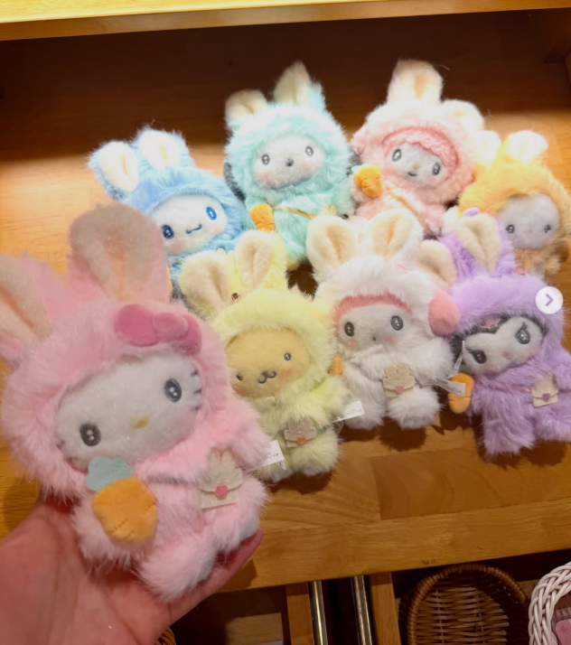 Pastel bunny character plushies displayed together