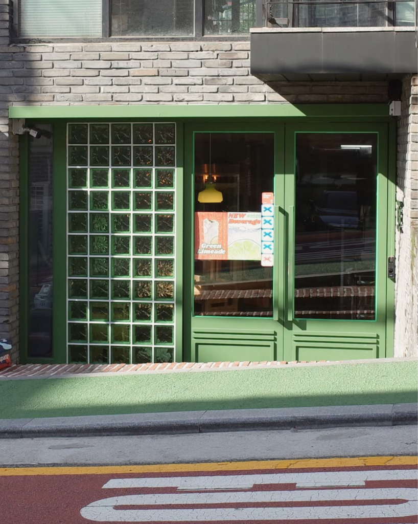 The jade green entrance at Jade & Water Oksu