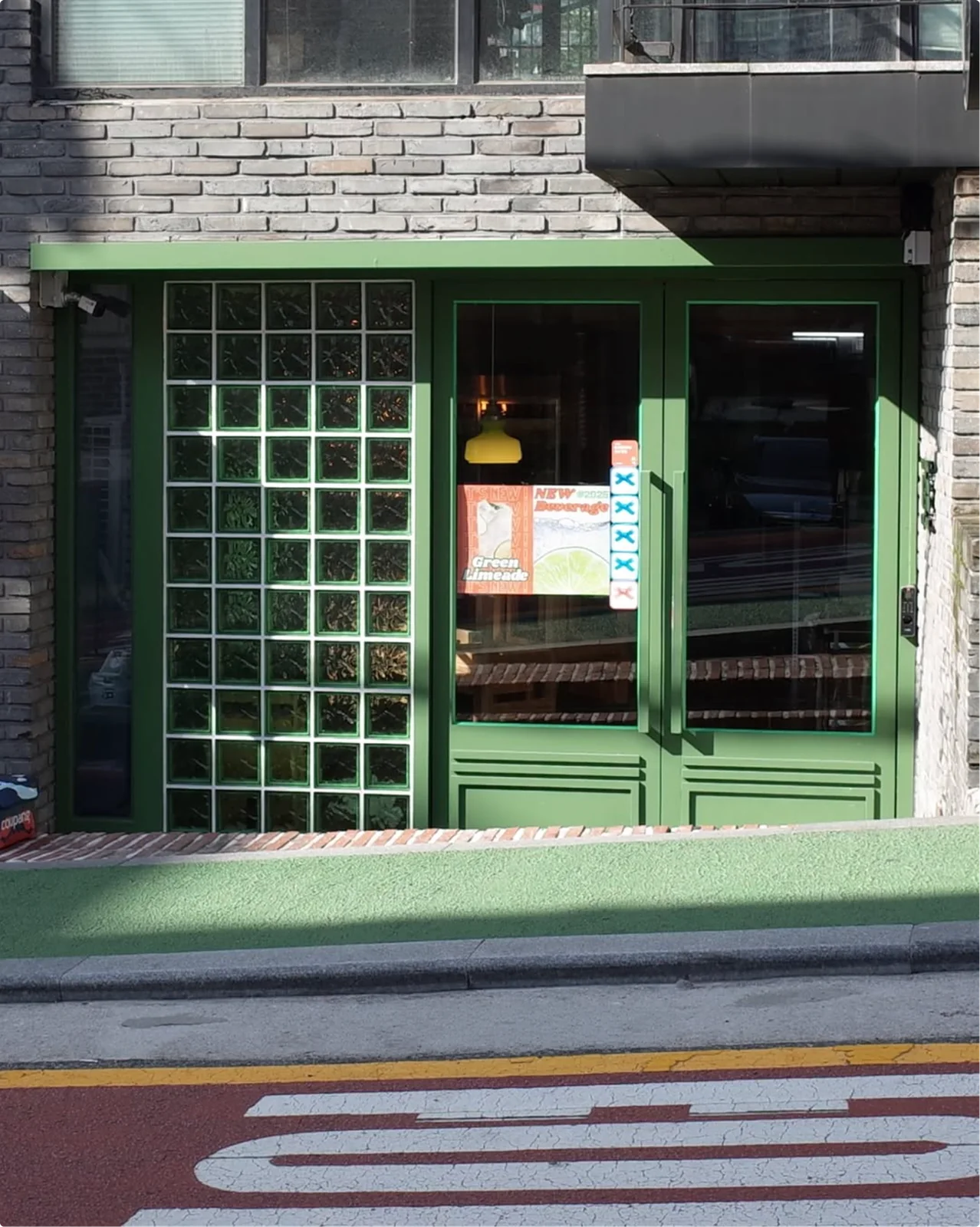 The green entrance of Jade & Water Oksu