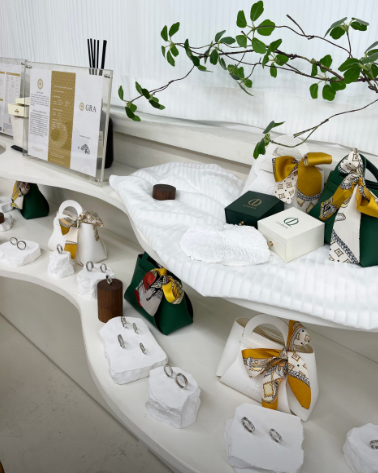 Loventa studio display shelf with jewelry and packaging